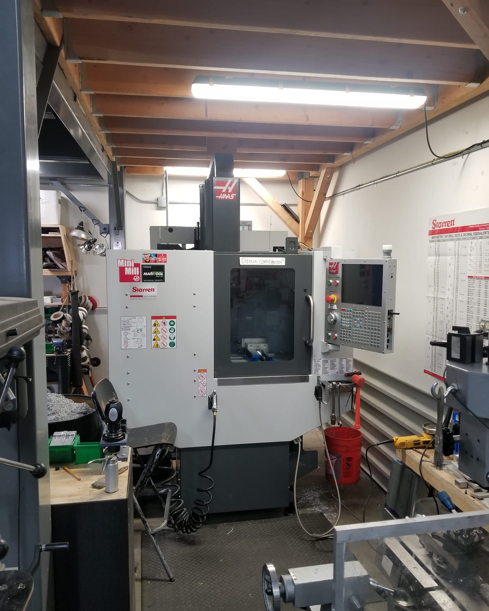 CNC milling machine in the Fluid Pictures machine shop, where custom camera parts are cut
