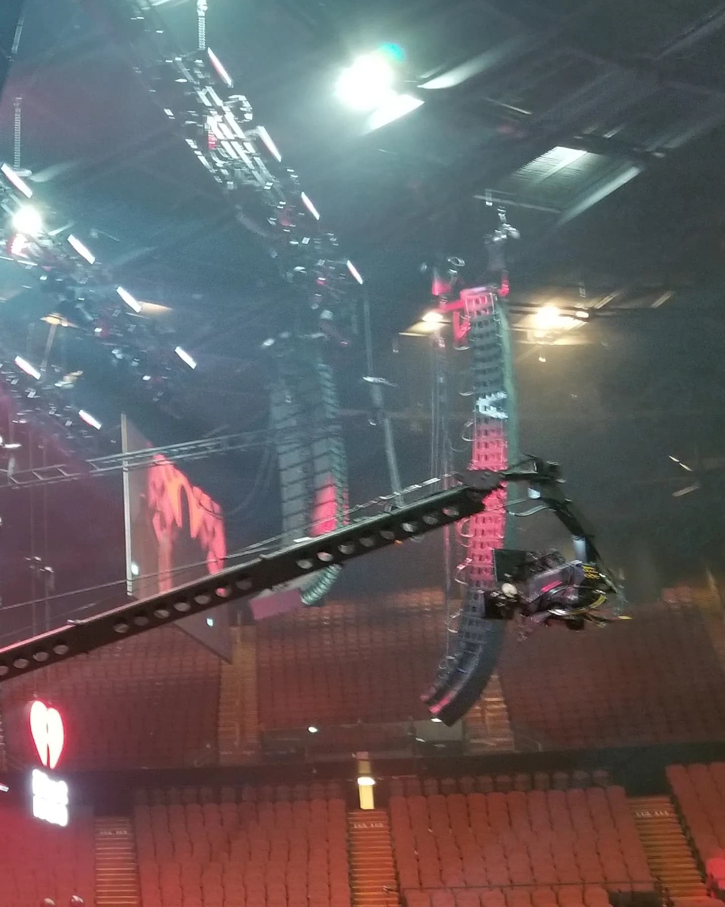 Stanton Triangle remote head with camera at the end of a jib arm reaching over theater seating